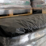 Pellet drzewny Expro palety z bliska na magazynie Paleko